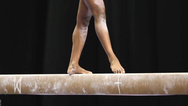 A gymnast on the beam
