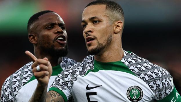 William Troost-Ekong (right)celebrates scoring for Nigeria against Ivory Coast at the 2023 Africa Cup of Nations