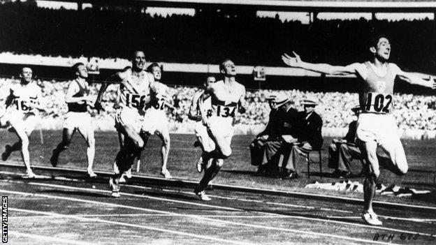 Ronnie Delany crosses the finish line to win the Olympic 1500m title in 1956