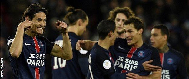 Paris St-Germain's players celebrate scoring against Troyes
