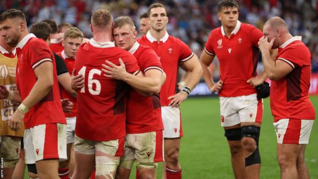 Wales captain Jac Morgan hugs Dewi Lake following defeat to Argentina