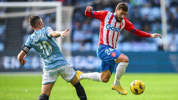 Girona forward Cristian Portu controls the ball against Celta Vigo.