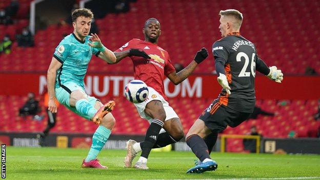 Diogo Jota in action against Manchester United (left)