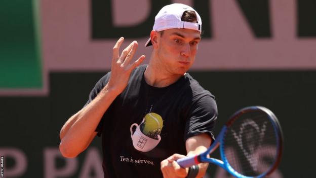 Jack Draper hits a return during a French Open practice session