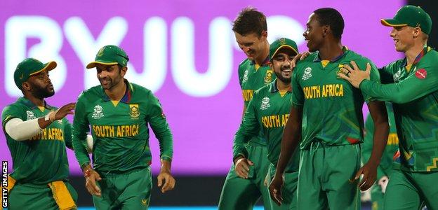 South Africa players celebrate beating England