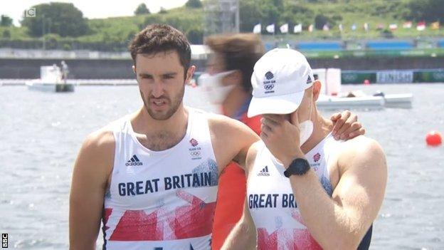 Ollie Cook (right) is consoled by British team-mate Sholto Carnegie