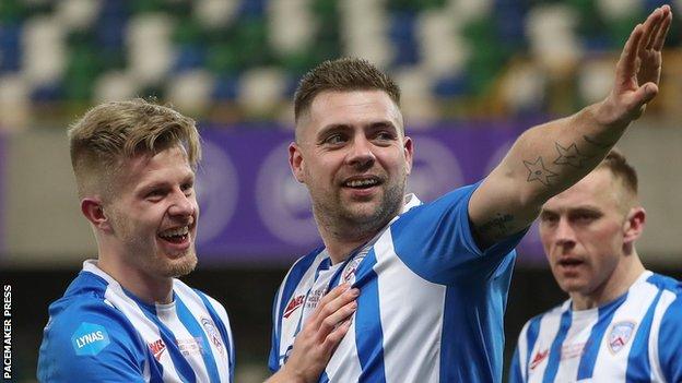 Coleraine's James McLaughlin celebrates after scoring the winner in the 2019-20 League Cup Final