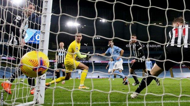 Ilkay Gundogan scores for Manchester City against Newcastle