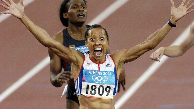 Dame Kelly Holmes crosses the finishing line to win the 800m at the 2004 Olympic Games