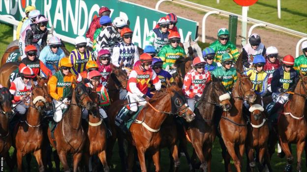 Horses racing in the Grand National