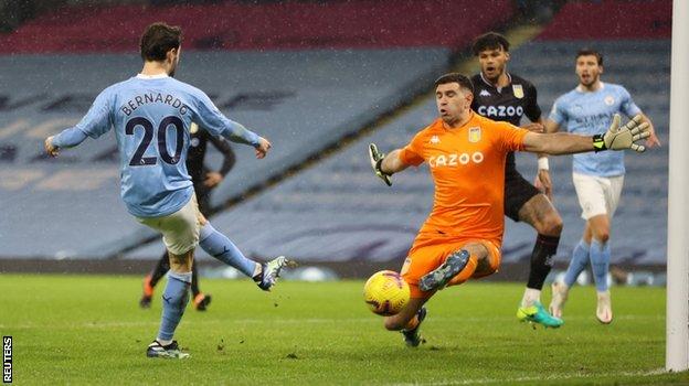 Man City 2-0 Aston Villa: City go top after hard-earned victory - BBC Sport