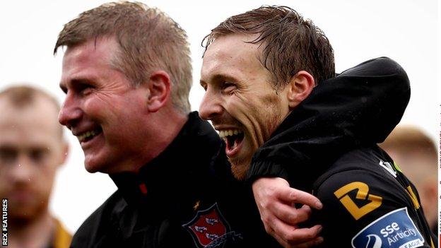 Dundalk manager Stephen Kenny and David McMillan celebrate their League of Ireland Cup win