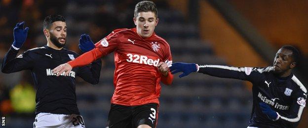 Rangers' Declan John (centre) in action against Dundee