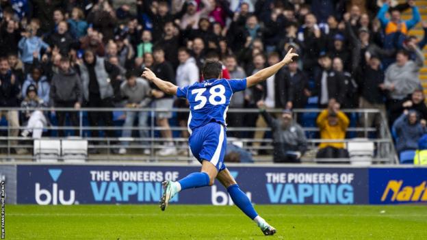 Perry Ng celebrates having scored in successive matches for the first time in his Cardiff career