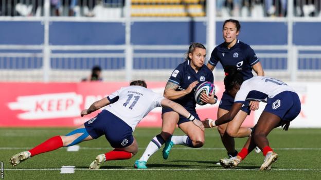 Chloe Rollie (centre) in action for Scotland during a Guinness Women's Six Nations match between Scotland and France at Hive Stadium