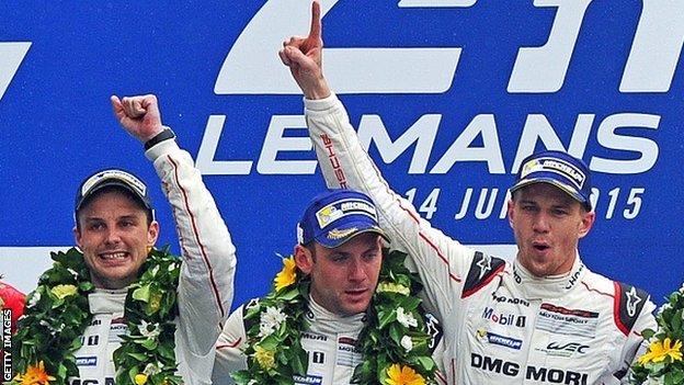 Nico Hulkenberg (right) celebrates victory in the 2015 Le Mans with fellow Porsche 919 drivers Earl Bamber (left) and Nicholas Tandy