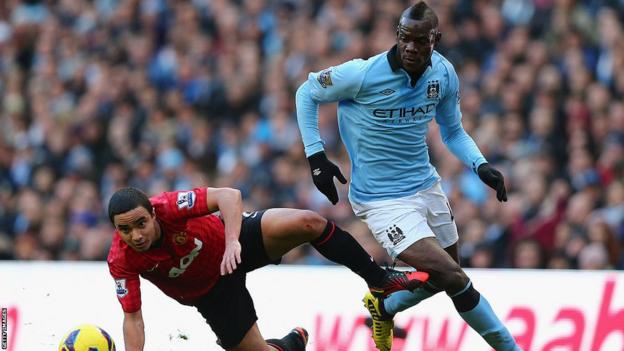 Mario Balotelli playing for Manchester City against Manchester United in the Premier League