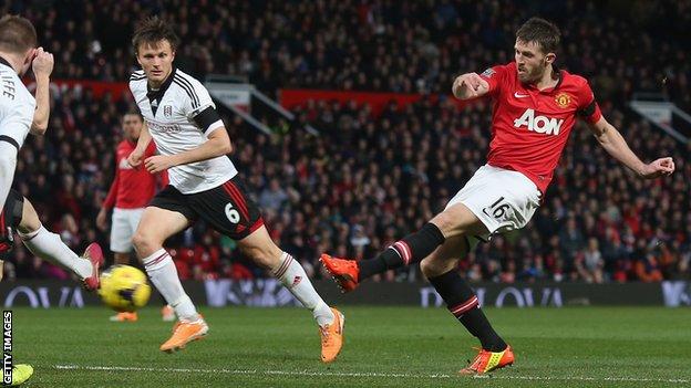 Michael Carrick (right) in action for Manchester United