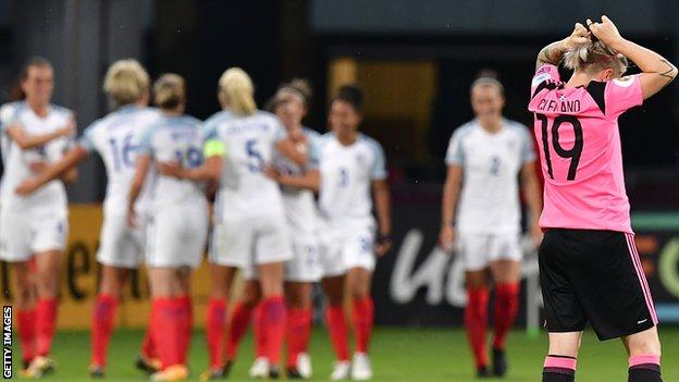 Scotland's Erin Cuthbert is left disappointed as England celebrate