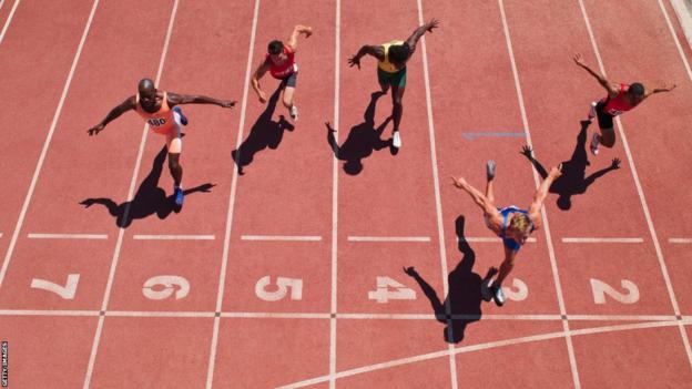 Generic shot of runners at the finish line of an athletics track