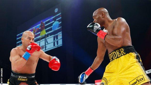 Tito Ortiz and Anderson Silva square off during the first round of the fight during Evander Holyfield vs. Vitor Belfort presented by Triller at Seminole Hard Rock Hotel & Casino on September 11, 2021 in Hollywood, Florida.