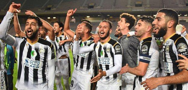Players of ES Setif celebrate their victory over Esperance of Tunisia in the African Champions League