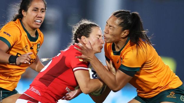 Jasmine Joyce is tackled high by Siokapesi Palu