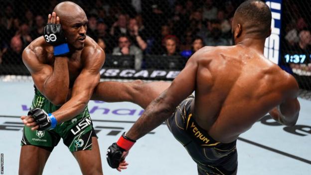 Leon Edwards kicks Kamaru Usman