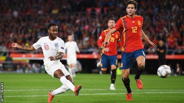 Raheem Sterling scores the opening goal for England against Spain