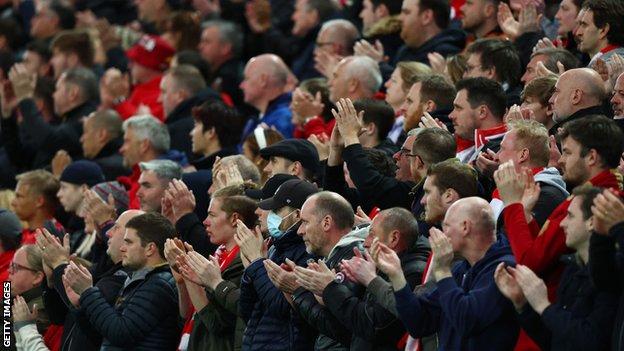 Liverpool fans applaud