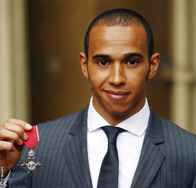Lewis Hamilton receives an MBE in 2009