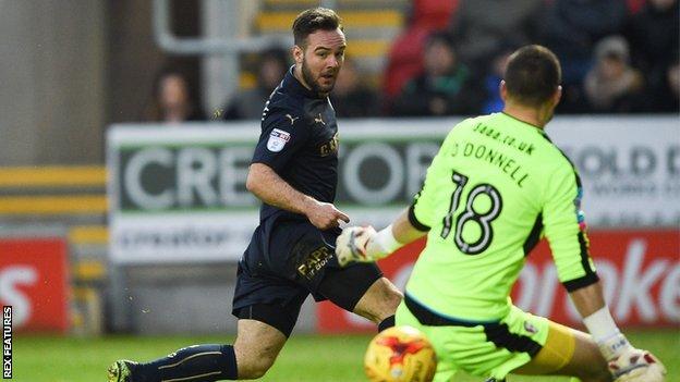 On-loan Adam Armstrong slots Barnsley's winner past Rotherham keeper Richard O'Donnell