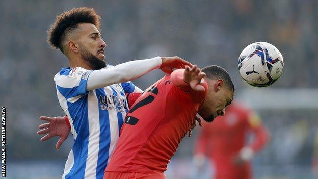 Sorba Thomas broke into Huddersfield's first team six months after being signed as a B team player from non-league Boreham Wood