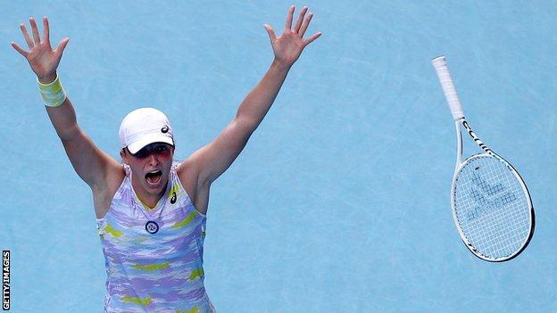Iga Swiatek celebrates beating Kaia Kanepi at the Australian Open