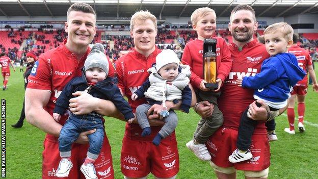 Scott Williams with son Seb, Aled Davies with son Freddie and John Barclay with sons Finn and Logan