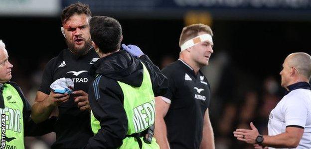 Angus Ta'avao receives treatment before being sent off