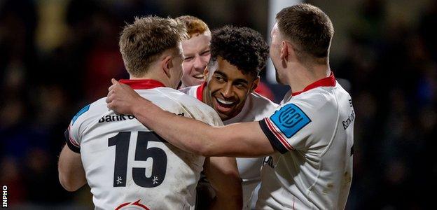 Robert Baloucoune celebrates his try with team-mates