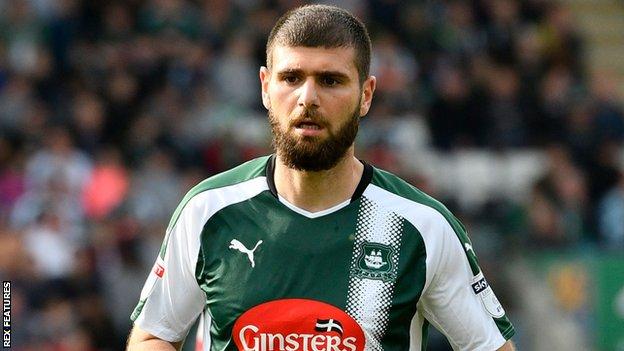 Nadir Ciftci playing for Plymouth Argyle.