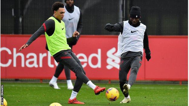 Trent Alexander-Arnold (L) and Naby Keita