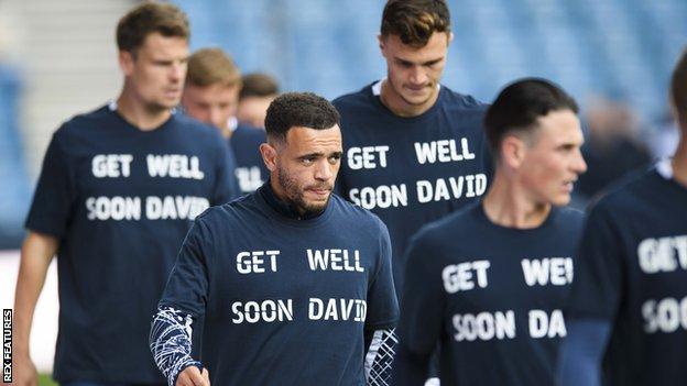 Players wear David Brooks t-hirts