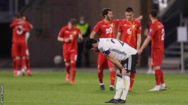 Ilkay Gundogan looks dejected after Germany are beaten by North Macedonia