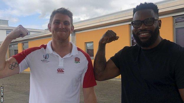 Ruaridh McConnochie showing off his Olympic tattoo with Ugo Monye