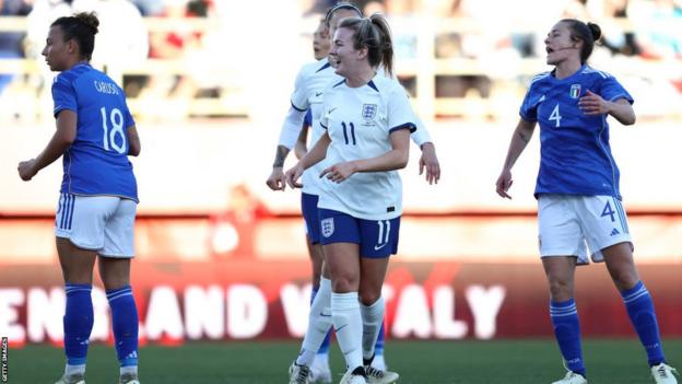 Lauren Hemp celebrates scoring for England