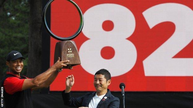 Woods moved on to a record-equalling 82 PGA Tour wins with victory in Japan
