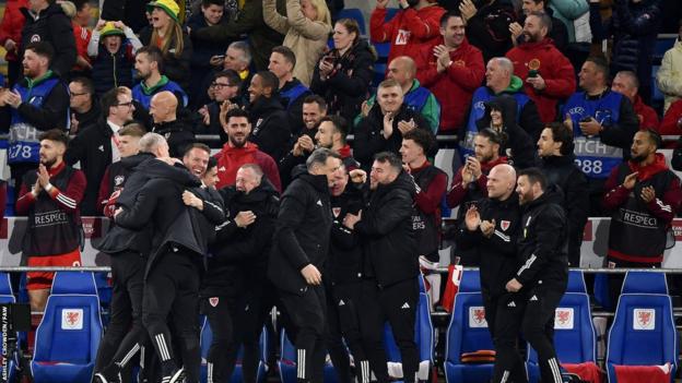The Bank of Wales celebrate their opening goal