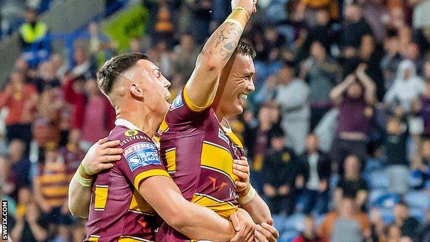 Danny Levi celebrates