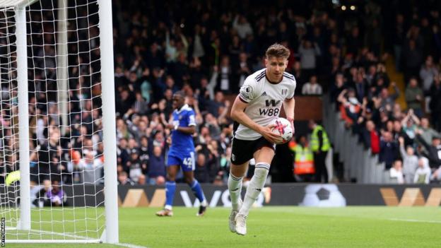 Tom Cairney celebrates his goal against Leicester City