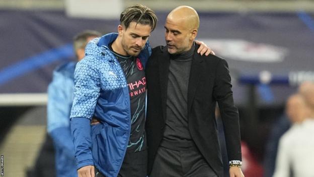 Jack Grealish's Burglary - Manchester City winger Jack Grealish with manager Pep Guardiola discussing player safety after the burglary incident