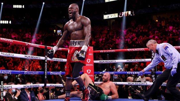 Deontay Wilder knocks down Tyson Fury