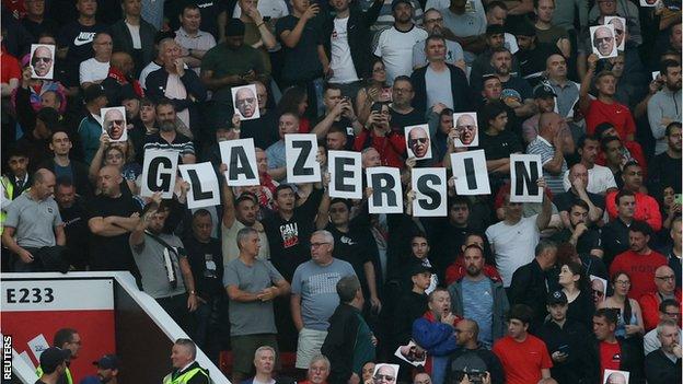Liverpool fans held up 'Glazers in' signs inside the stadium